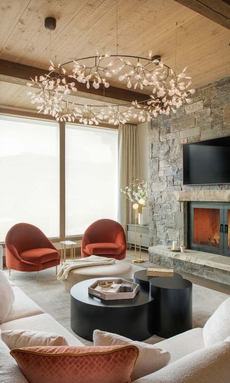 A modern indoor lighting fixture by Lutron installed on a ceiling, illuminating a contemporary room with warm ambient light.